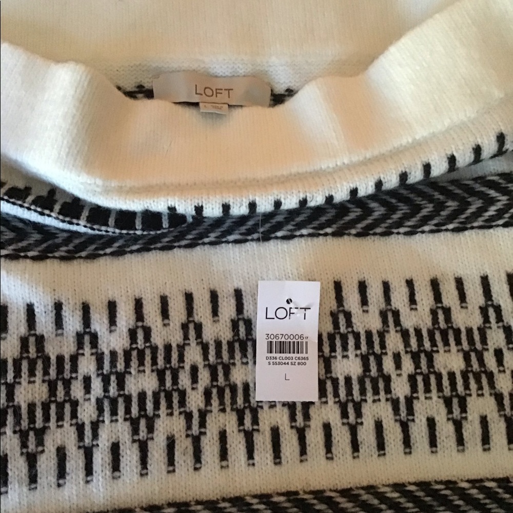 Brand new, never worn, LOFT soft  sweater skirt. Size is large.